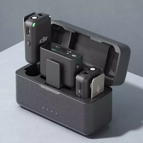DJI Mic charging cradle with receiver and transmitters. 