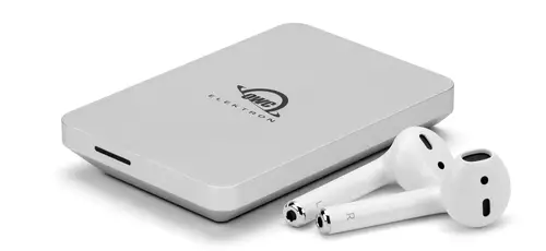 OWC Envoy Pro Elektron in size comparison with a pair of Airpods